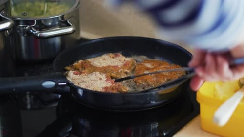 Frying delicious homemade veggie beef patties - close up
