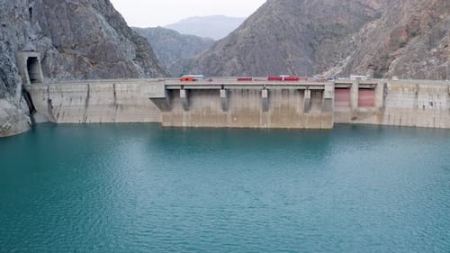 Hydroelectric power station surrounded with mountains