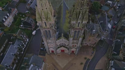 Notre-Dame de l'Assomption church, La in Normandy, France. Aerial top down ascending