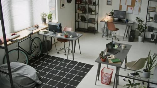 Software Company Office with Employee Desks and Recreational Area