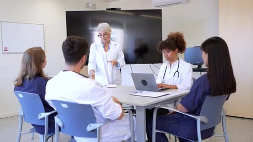 Medical Team Meeting in Bright Conference Room
