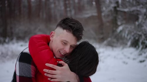 People Relax and Enjoy Walks in the Forest in Winter