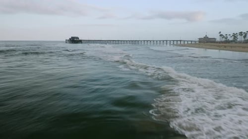 Aerial Drone Shot of Newport Beach Pier - Low Push in - 4K UHD