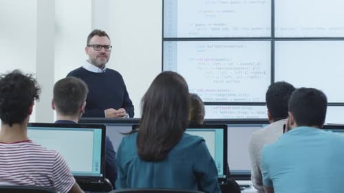 Teacher Giving Coding Lecture to Students