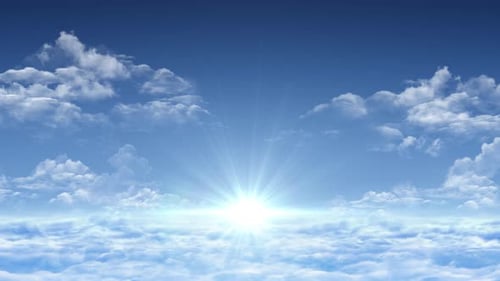 Bright Sun Rays Above Fluffy Clouds in Blue Sky