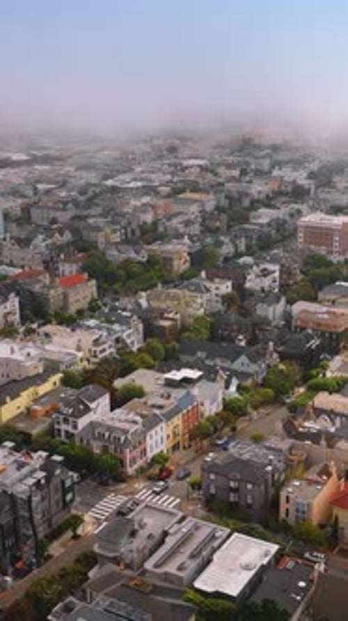 Densely built urban panorama of contemporary San Francisco at daytime.