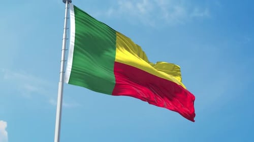 Benin National Flag Waving in the Wind with Blue Sky