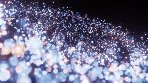 particles donut shaped blue galaxies revolve around themselves. bokeh background