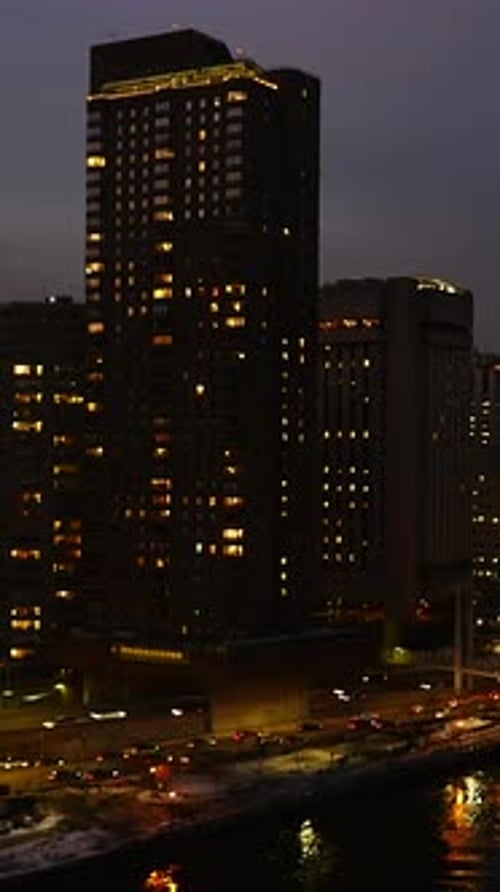 Vertical Video of Modern Urban City High Rise Buildings Real Estate