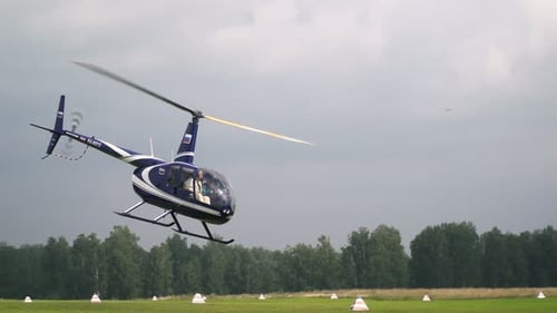 Novosibirsk Russia - July 31 2016: Helicopter R-44 Takes Off. Fly In