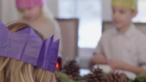 Children and Adult at a Christmas Celebration