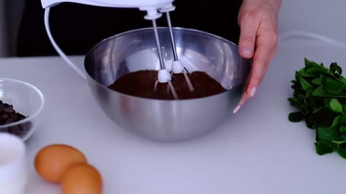 Mixing Chocolate Cake Batter with Hand Mixer