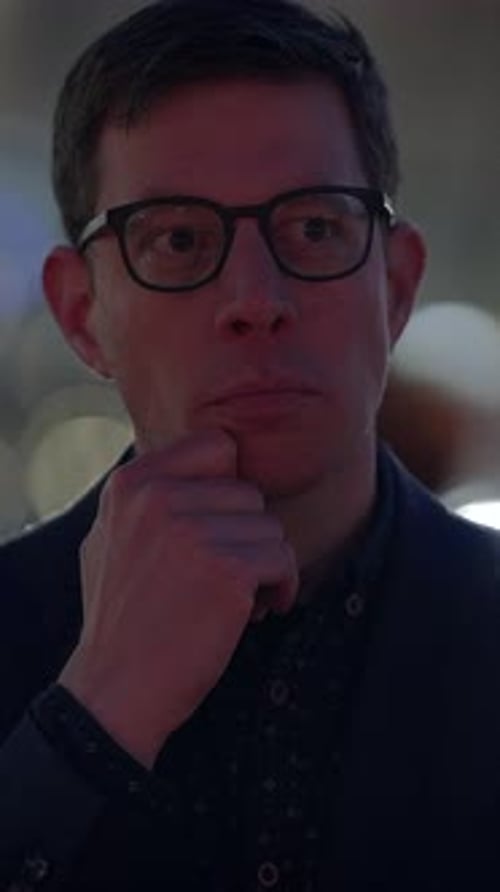 Man in Glasses indoors