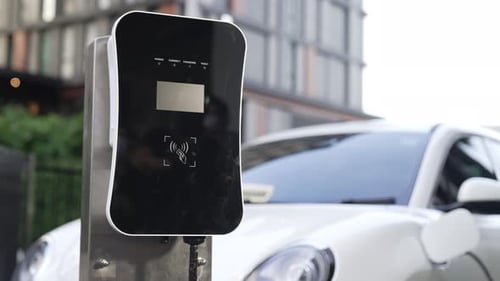 Progressive innovation urban electric on-street charging station with EV car.