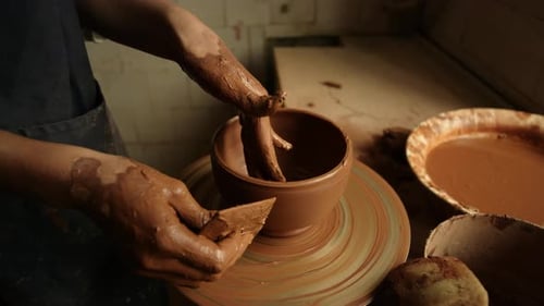 Unrecognized Woman Sculpting Clay Pot in Workshop. Closeup Lady Making Product On