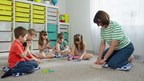 Pupils and the Teacher Play Developmental Games in Primary School