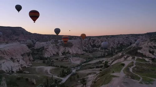 A Balloon Flies Over Cappadocia Shooting From a Drone in