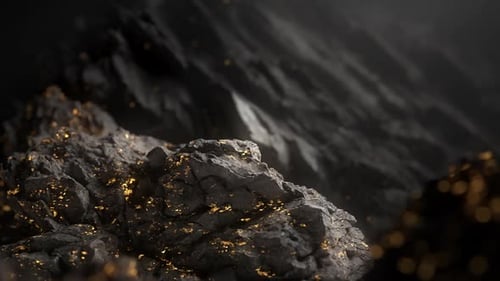 Abstract Golden Particles Flowing Over Dark Rocks