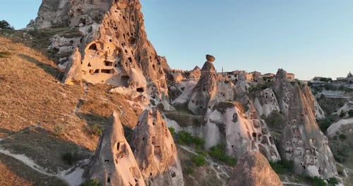 Aerial View of Natural Rock Formations in the Sunset Valley with Cave Houses in Cappadocia Turkey