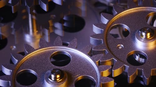 Silver Gears Turning Close Up Abstract