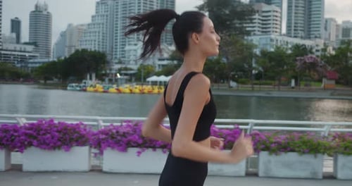 Bustling Cityscape Woman Sports Enthusiast Indulges Fitness Running Urban Park Fitness Dedication