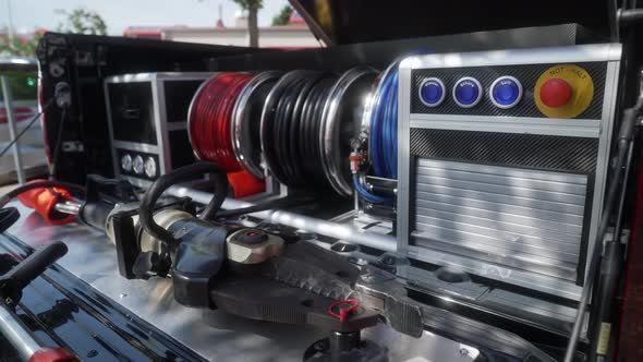 Modern firefighters rescue car pickup with firefighters equipment ...