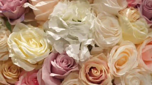 Assorted Pale Roses in a Floral Arrangement
