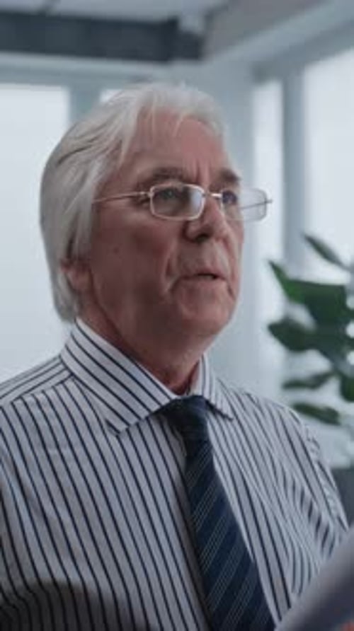 Senior Boss of the Company with Papers Talks to Female Financial Specialist