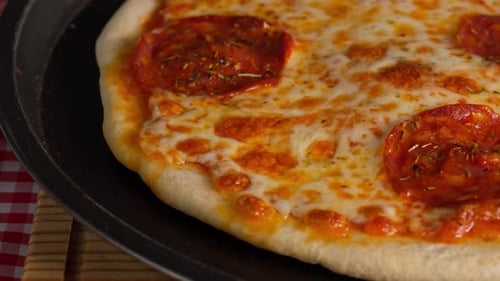 Macro View Of Melted Cheese With Pepperoni Grease