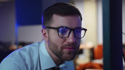 Trader Investor Broker in Eyeglasses and Formal Wear Working with Pc While Sitting in His Office in