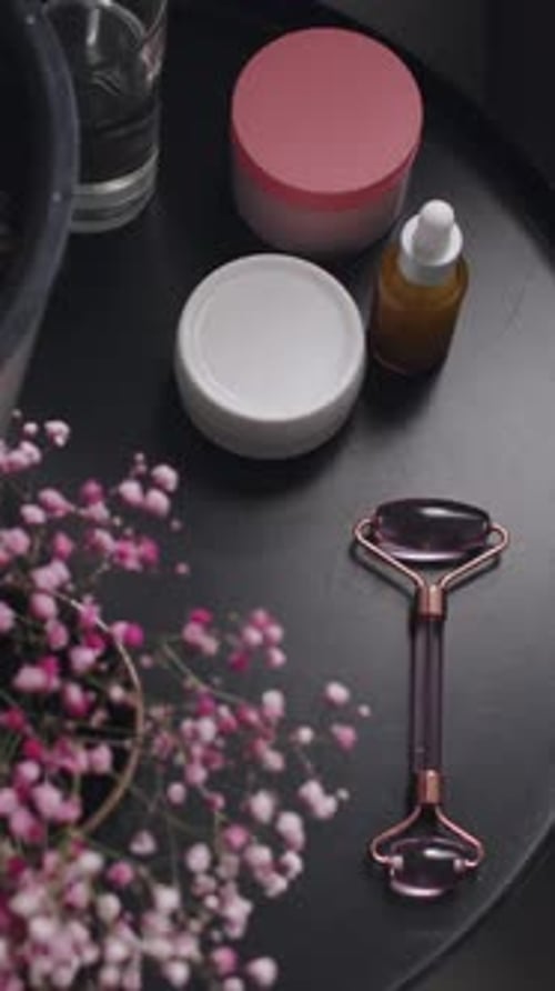 Beauty Products and Rose Quartz Facial Roller
