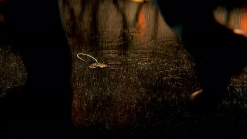 Military Dog Tag Floating in Reflective Rain