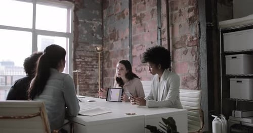 Businesswomen presenting to a client