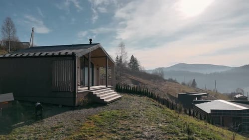 Modern House on Mountainside Scenic Landscape