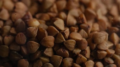 Heap of Dry Buckwheat Grains Macro Close Up