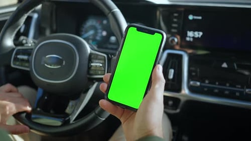 The Green Screen of the Phone is Chroma Key in the Car