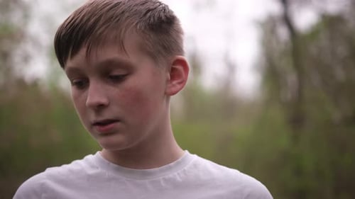 Teenage Boy Talking Something Expressive Outdoors in the City Park Close Up Portrait Young Boy