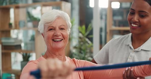Senior Woman Exercising with Resistance Band