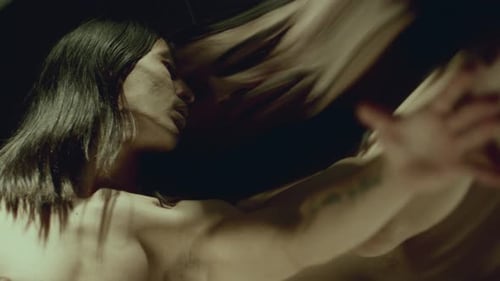 Mesmerized Dancer Leaning against Distorting Mirror in Contemporary Performance
