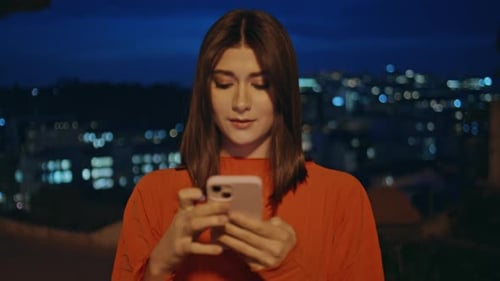 Carefree Girl Strolling Night City Holding Smartphone Closeup Lady Using Mobile