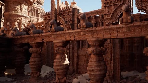 Un grand mur de temple ornemental avec des statues ornant son sommet