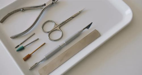 Manicure Tools Arranged on White Tray