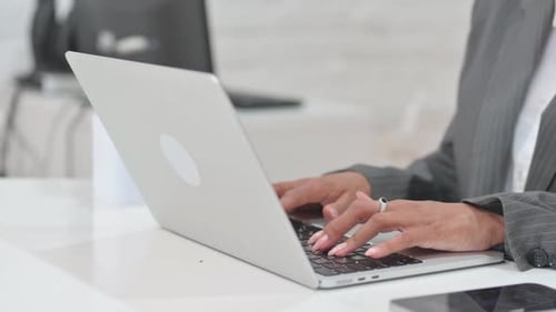 Close up of Woman Typing on Laptop