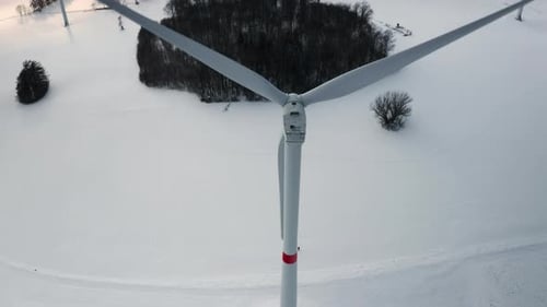 Aerial View of a Wind Turbine Park in the Winter Field As a Hub of Renewable Energy Production