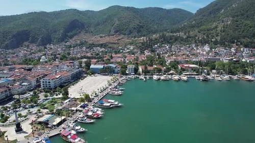 Drone shot of Boats parked in the Fethiye Marina with the square in field