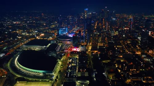 Nightlife of a modern vibrant metropolis. Drone footage above the downtown of Los Angeles