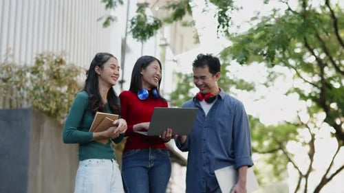 Student friend sit and talk about learning content subject in classroom in university or high school