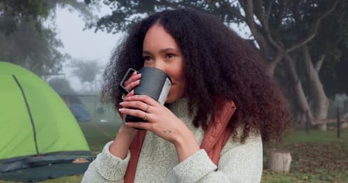 Woman Drinking Coffee Camping on Foggy Morning