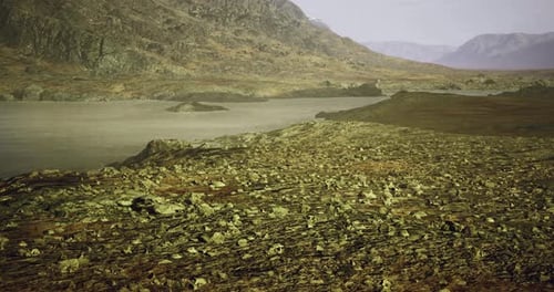 Exploring Rugged Terrain Distant Mountains and a Calm Lake