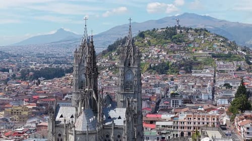 Aerial Panorama Revealing Quito's Landmark Basilica Del Voto Nacional and Virgin Mary Statue Perched
